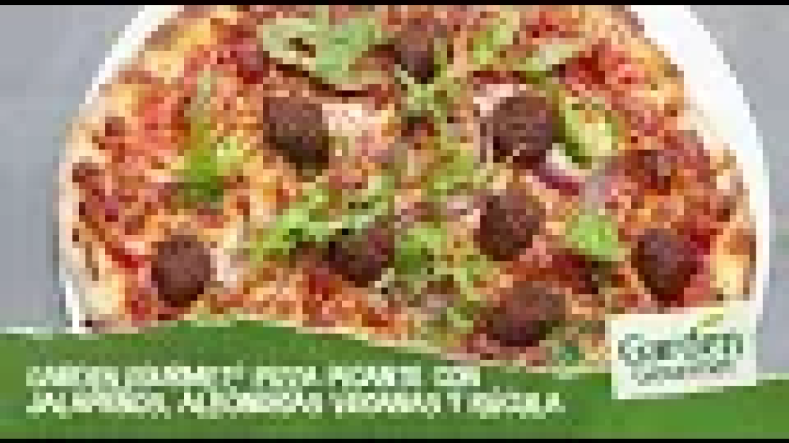 Pizza picante con jalapeños, albóndigas veganas y rúcula